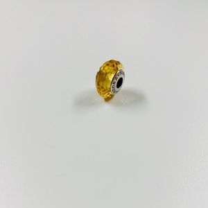 Yellow glass pandora charm